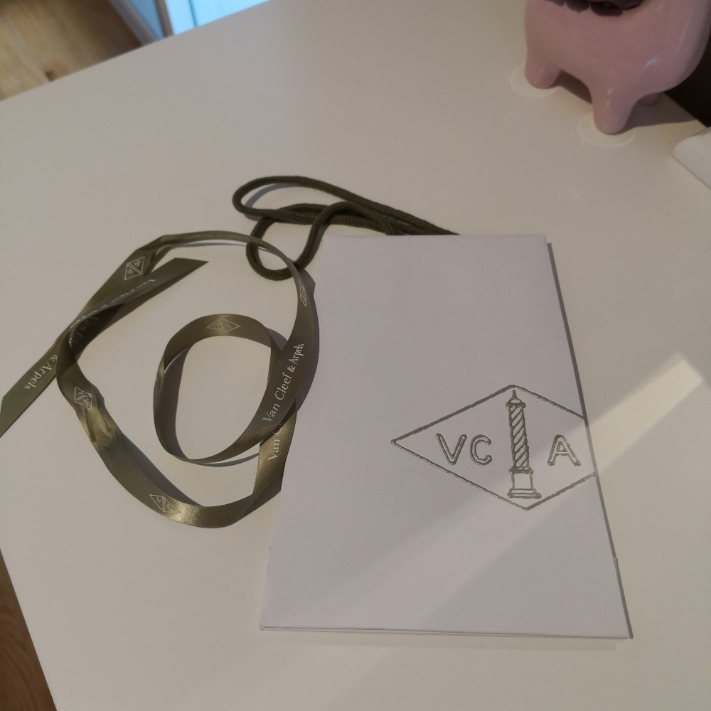 Van Cleef & Arpels bag and ribbon